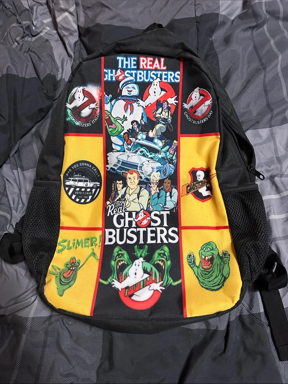 Ghostbusters Printed Black & Yellow Backpack - The Real Ghostbusters